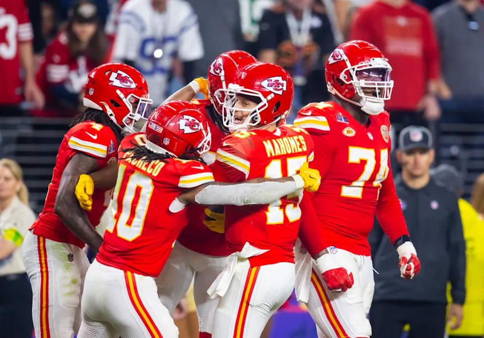 Kansas City Chiefs quarterback Patrick Mahomes celebrates with running back Isiah Pacheco and offensive tackle Jawaan Taylor.Mark J&period; Rebilas-USA TODAY Sports