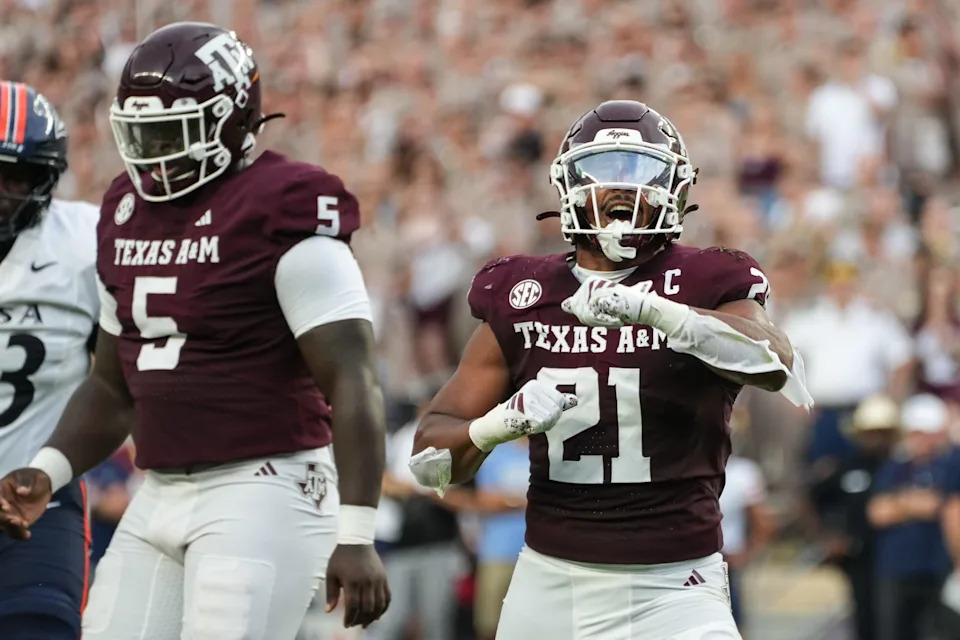 Aug 30, 2025; College Station, Texas, USA; Texas A&M Aggies linebacker Taurean York (21) celebrates after a sack in the first quarter against the UTSA Roadrunners at Kyle Field. Mandatory Credit: Sean Thomas-Imagn Images