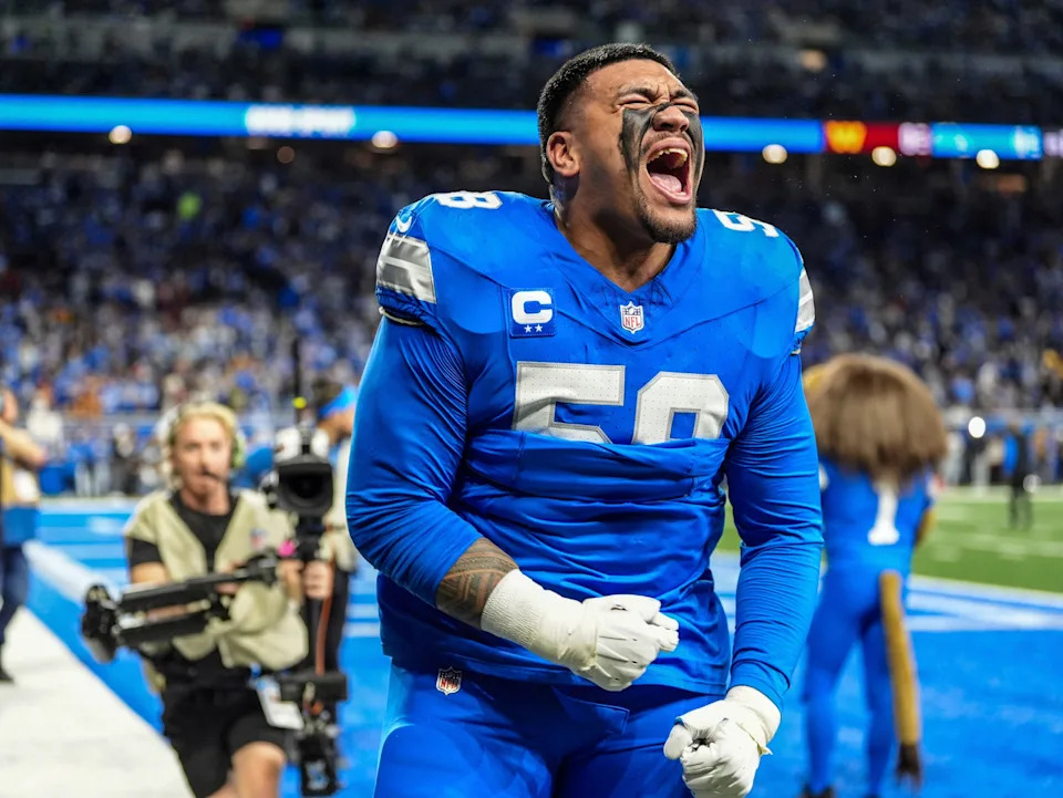 Detroit Lions offensive tackle Penei Sewell (58) yells out after warming up before the game against the Washington Commanders at Ford Field in Detroit, Saturday, Jan. 18, 2025.