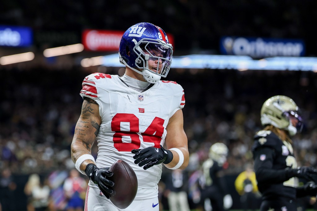 Theo Johnson celebrates after catching a touchdown catch during the Giants-Saints game on Oct. 5, 2025. 