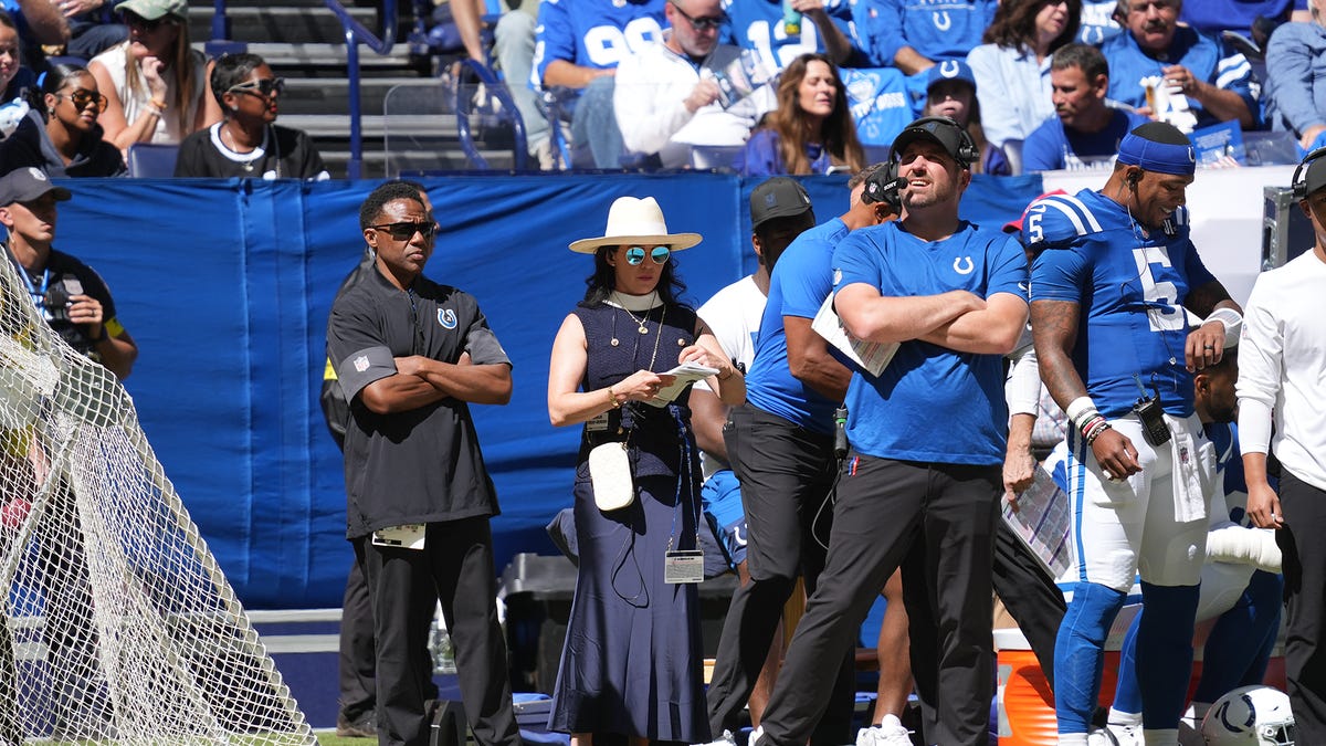 Why does Colts owner Carlie Irsay-Gordon wear a headset on sideline?
