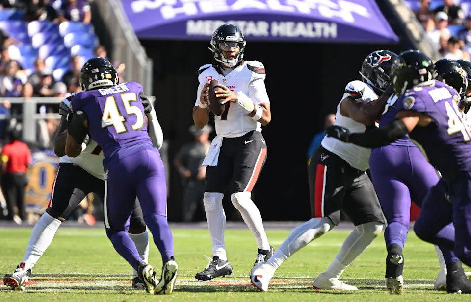 Oct 5, 2025; Baltimore, Maryland, USA; Houston Texans quarterback C.J. Stroud (7) looks to throw downfield during the third quarter against the Baltimore Ravens at M&T Bank Stadium. Mandatory Credit: Rafael Suanes-Imagn Images