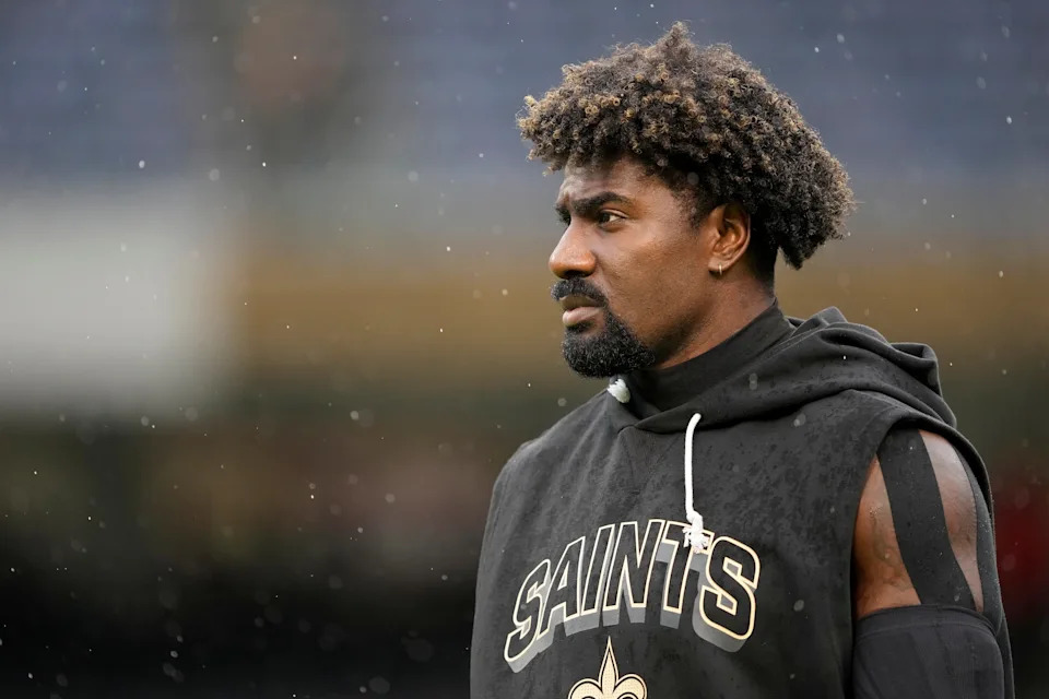 CHICAGO, ILLINOIS - OCTOBER 19: Juwan Johnson #83 of the New Orleans Saints warms up prior to a game against the Chicago Bears at Soldier Field on October 19, 2025 in Chicago, Illinois. (Photo by Patrick McDermott/Getty Images)