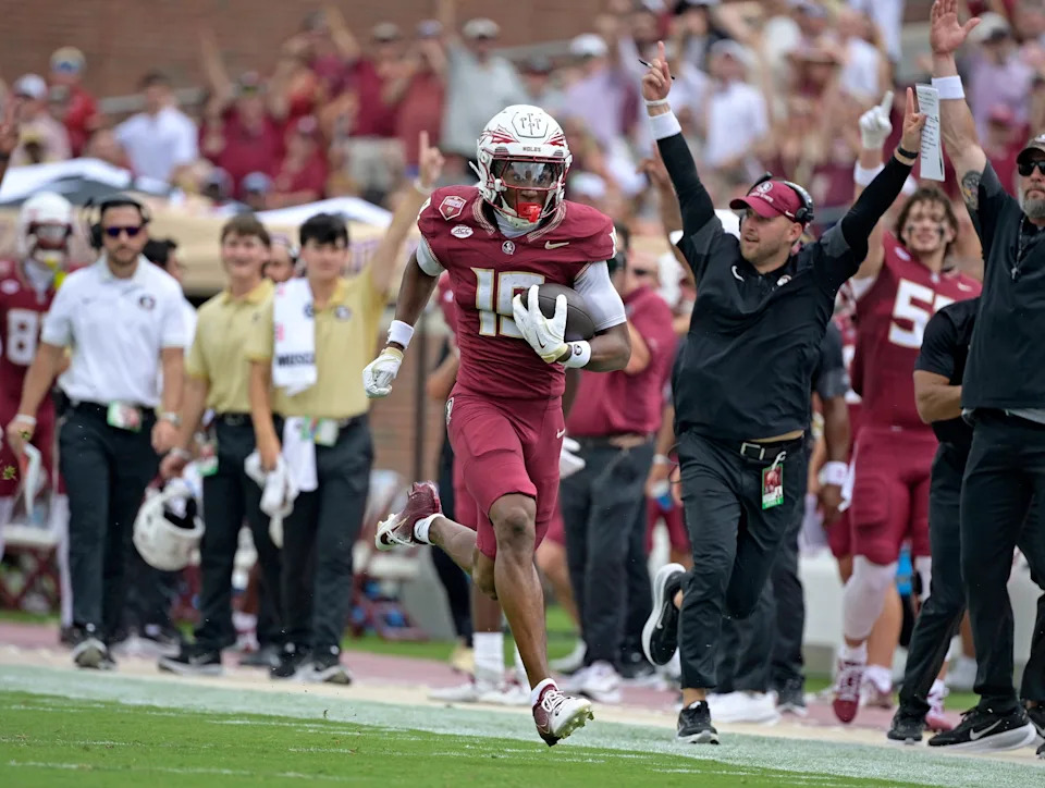 Sep 20, 2025; Tallahassee, Florida, USA; Florida State Seminoles wide receiver Michai Danzy (19) scores a touchdown against the the Kent State Golden Flashes during the first half at Doak S. Campbell Stadium. Mandatory Credit: Melina Myers-Imagn Images
