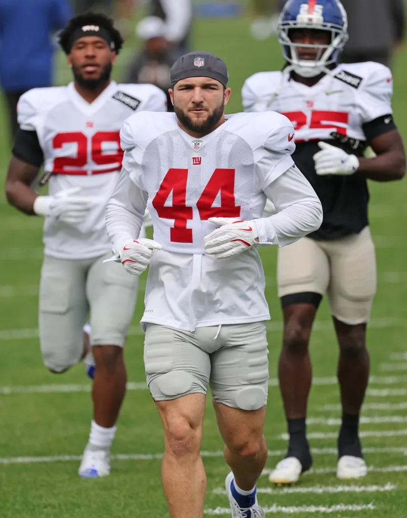 Cam Skattebo jogs during practice at the Giants training facility in East Rutherford, N.J. Charles Wenzelberg / New York Post