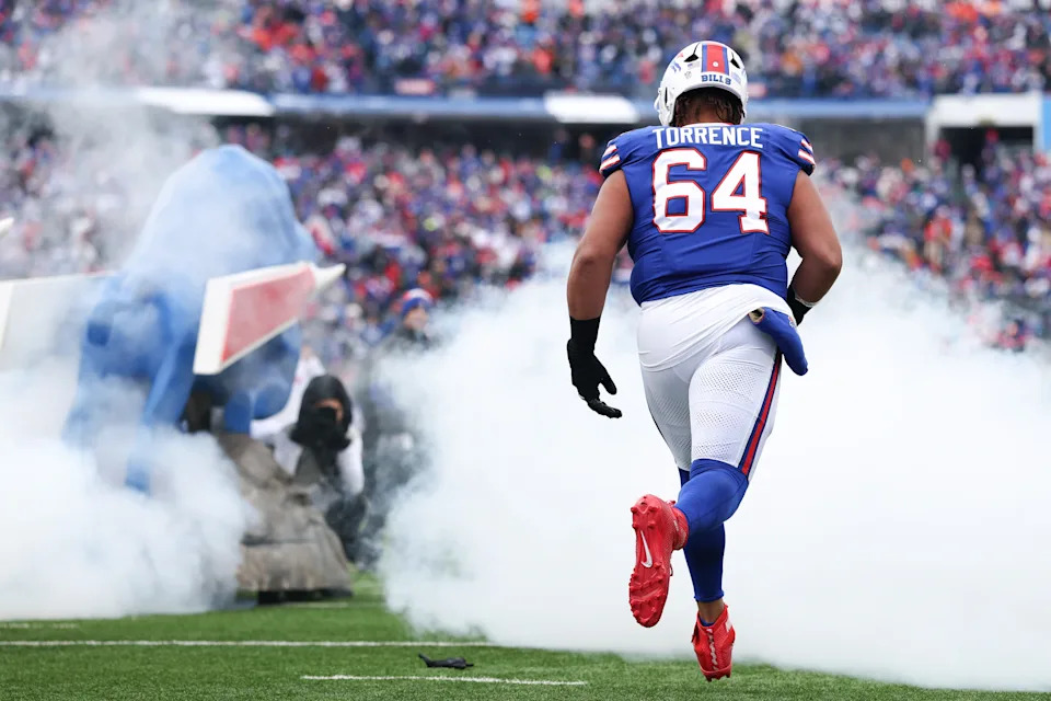 ORCHARD PARK, NEW YORK - JANUARY 12: O'Cyrus Torrence #64 of the Buffalo Bills takes the field prior to playing the Denver Broncos during the AFC Wild Card Playoffs at Highmark Stadium on January 12, 2025 in Orchard Park, New York. (Photo by Elsa/Getty Images)