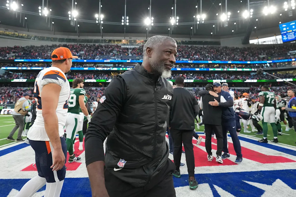 Oct 12, 2025; Tottenham, United Kingdom; New York Jets head coach Aaron Glenn leaves the field after an NFL International Series game against the Denver Broncos at Tottenham Hotspur Stadium. Mandatory Credit: Kirby Lee-Imagn Images