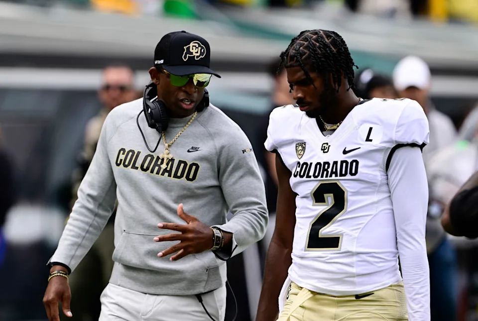 Colorado Buffaloes head coach Deion Sanders talks with his son QB Shedeur Sanders before the game against the Oregon Ducks at Autzen Stadium September 23, 2023.Andy Cross&sol;MediaNews Group&sol;The Denver Post via Getty Images&sol;Getty Images