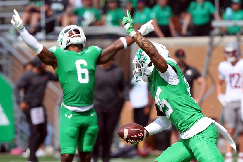 North Texas linebacker Trey Fields (6) celebrates the interception by North Texas cornerback...