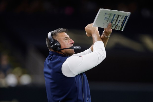New England Patriots head coach Mike Vrabel reacts during the second half of an NFL football game against the New Orleans Saints, Sunday, Oct. 12, 2025, in New Orleans. (AP Photo/Butch Dill)