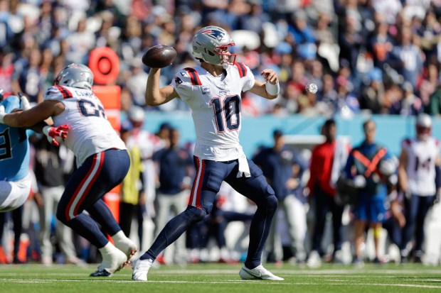 New England Patriots quarterback Drake Maye (10) passes the ball during the second half of an NFL football game against the Tennessee Titans, Sunday, Oct. 19, 2025, in Nashville, Tenn. (AP Photo/Stew Milne)