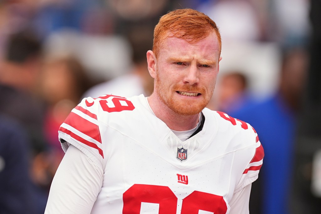 New York Giants kicker Jude McAtamney (99) reacts during warm ups before an NFL football game Sunday, Oct. 19, 2025, in Denver.