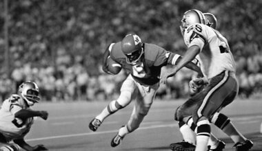 Warren McVea (6) Kansas City Chiefs running back is stopped on an end run by Dallas Cowboy Leroy Jordan (55) in the first quarter action in Dallas, Sept. 5, 1970. (AP Photo/Fred Kaufman)