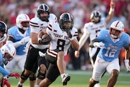 Texas Tech running back Cameron Dickey (8) runs the ball against Houston linebacker Sione...