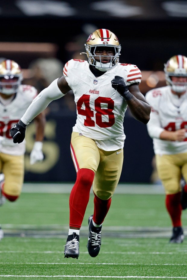 San Francisco 49ers linebacker Tatum Bethune (48) runs a route during an NFL football game against the New Orleans Saints, Sunday, Sep. 14, 2024, in New Orleans. (AP Photo/Tyler Kaufman)
