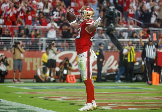 San Francisco 49ers' Christian McCaffrey (23) celebrates his touchdown against the Atlanta Falcons in the second quarter at Levi's Stadium in Santa Clara, Calif., on Sunday, Oct. 19, 2025. (Nhat V. Meyer/Bay Area News Group)