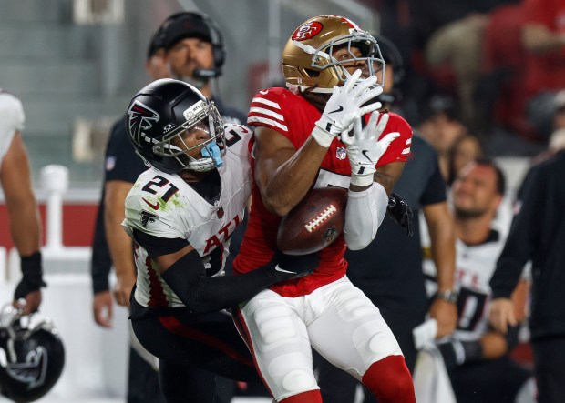 San Francisco 49ers' Demarcus Robinson (5) can't make a catch against Atlanta Falcons' Mike Hughes (21) in the fourth quarter at Levi's Stadium in Santa Clara, Calif., on Sunday, Oct. 19, 2025. (Nhat V. Meyer/Bay Area News Group)