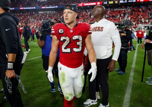 San Francisco 49ers' Christian McCaffrey (23) walks on the field after their 20-10 win over the Atlanta Falcons at Levi's Stadium in Santa Clara, Calif., on Sunday, Oct. 19, 2025. (Nhat V. Meyer/Bay Area News Group)