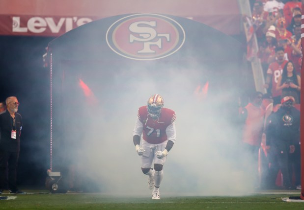 San Francisco 49ers' Trent Williams (71) heads onto the field before their game against the Dallas Cowboys at Levi's Stadium in Santa Clara, Calif., on Sunday, Oct. 27, 2024. (Nhat V. Meyer/Bay Area News Group)