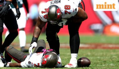 Bucky Irving #7 of the Tampa Bay Buccaneers lays on the field after being injured against the Philadelphia Eagles during the second quarter in the game at Raymond James Stadium.