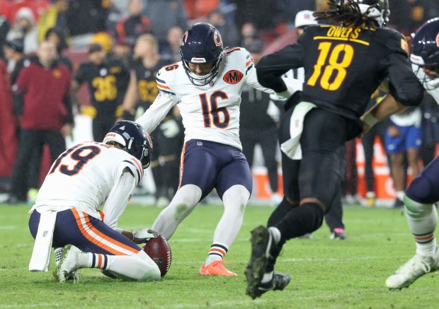 Chicago Bears kicker Jake Moody kicks a game-winning field goal...