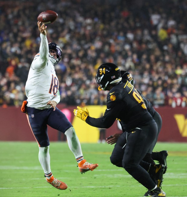 Bears quarterback Caleb Williams makes an unsuccessful two-point conversion pass...