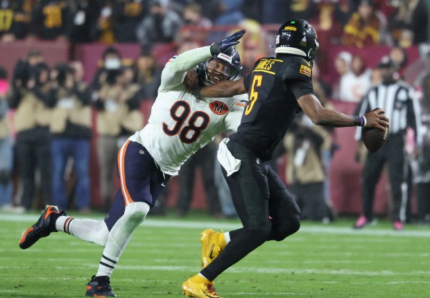 Bears defensive end Montez Sweat puts pressure on Commanders quarterback...