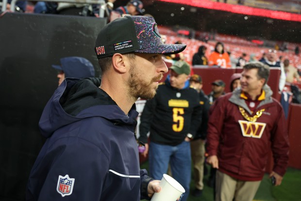 Chicago Bears kicker Cairo Santos walks on the field before...