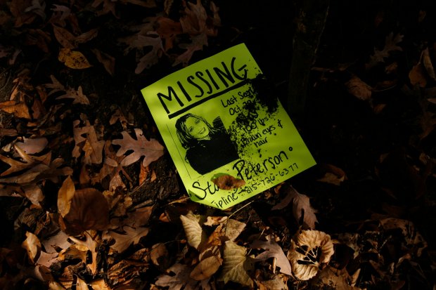 A flyer is left behind as friends and family of Stacy Peterson search Knoch Knolls Park in Naperville on Nov. 3, 2007. (Bonnie Trafelet/Chicago Tribune)