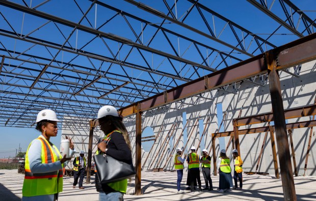 Visitors tour the new practice facility for the Chicago Sky...