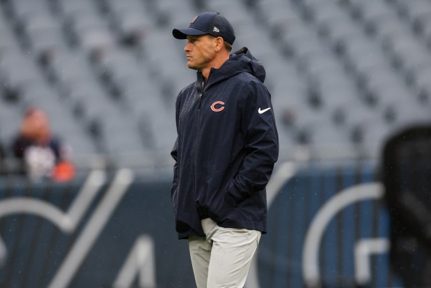 Bears coach Ben Johnson walks on the field before playing the Saints on Sunday, Oct. 19, 2025 at Soldier Field. (Armando L. Sanchez/Chicago Tribune)