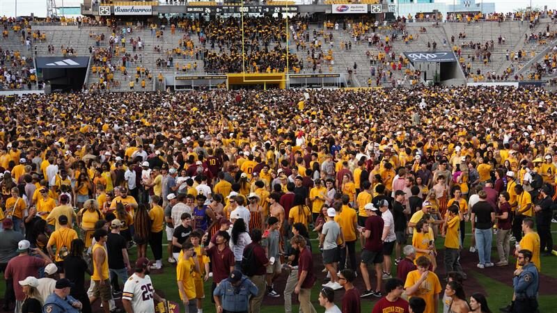 fine Arizona State storm the football field Texas Tech win...