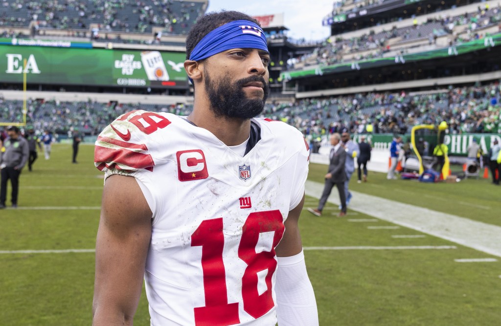 A dejected Darius Slayton walks off the field after the Giants' Week 8 loss to the Eagles.