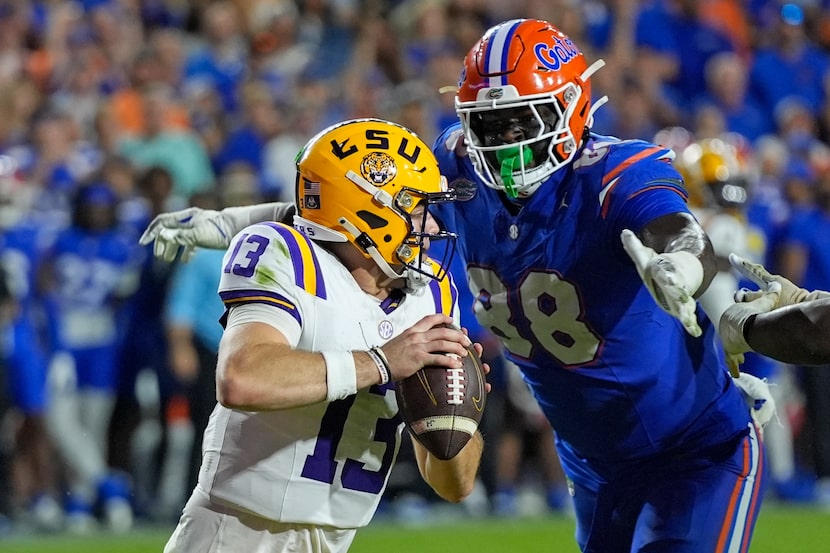 Florida defensive lineman Caleb Banks (88) sacks LSU quarterback Garrett Nussmeier (13)...