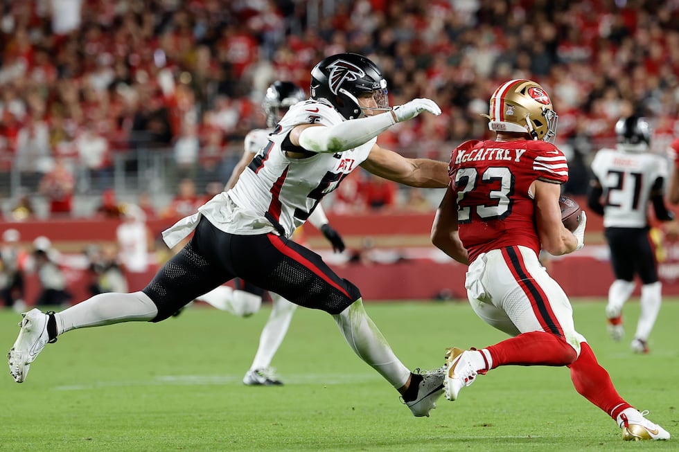 San Francisco 49ers running back Christian McCaffrey (23) runs against Atlanta Falcons...