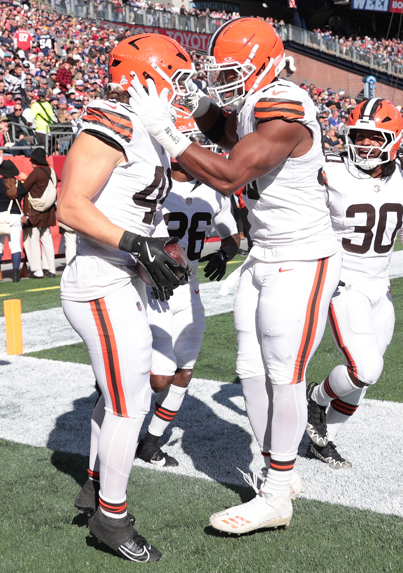Cleveland Browns linebacker Carson Schwesinger (L) celebrates his interception with Cleveland Browns defensive end Myles Garrett in the second quarter abasing the New England Patriots.  