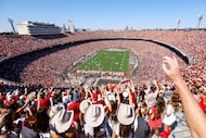 Oklahoma fans cheer during the Red River Rivalry at the Cotton Bowl against Texas, on...
