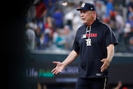 After arguing with umpire Vic Carapazza, Texas Rangers manager Bruce Bochy is upset with the...
