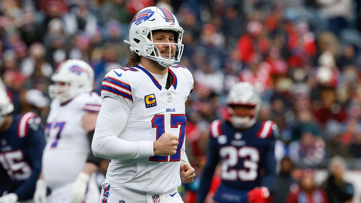 FOXBOROUGH, MASSACHUSETTS - JANUARY 5: Josh Allen #17 of the Buffalo Bills runs off the field after his only snap of the game against the New England Patriots during the first quarter to extend his streak of consecutive starts to 115 games, including the playoffs at the Gillette Stadium on January 5, 2025 in Foxborough, Massachusetts. The Patriots won 23-16. (Photo by Rich Gagnon/Getty Images)