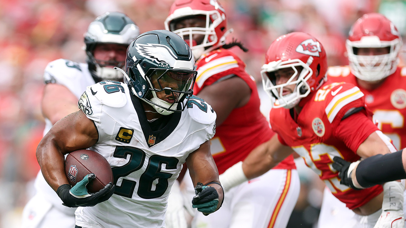 Running back Saquon Barkley 26 of the Philadelphia Eagles carries the ball during the game against the Kansas City Chiefs at Arrowhead Stadium on September 14, 2025 in Kansas City, Missouri.