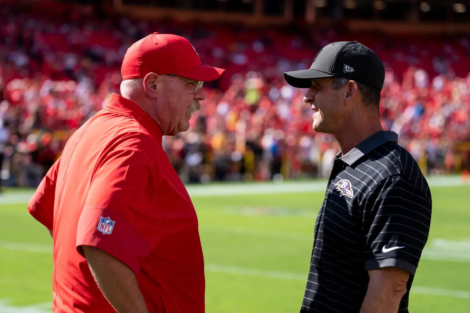 Head coach Andy Reid of the Kansas City Chiefs and Head coach John Harbaugh of the Baltimore Ravens