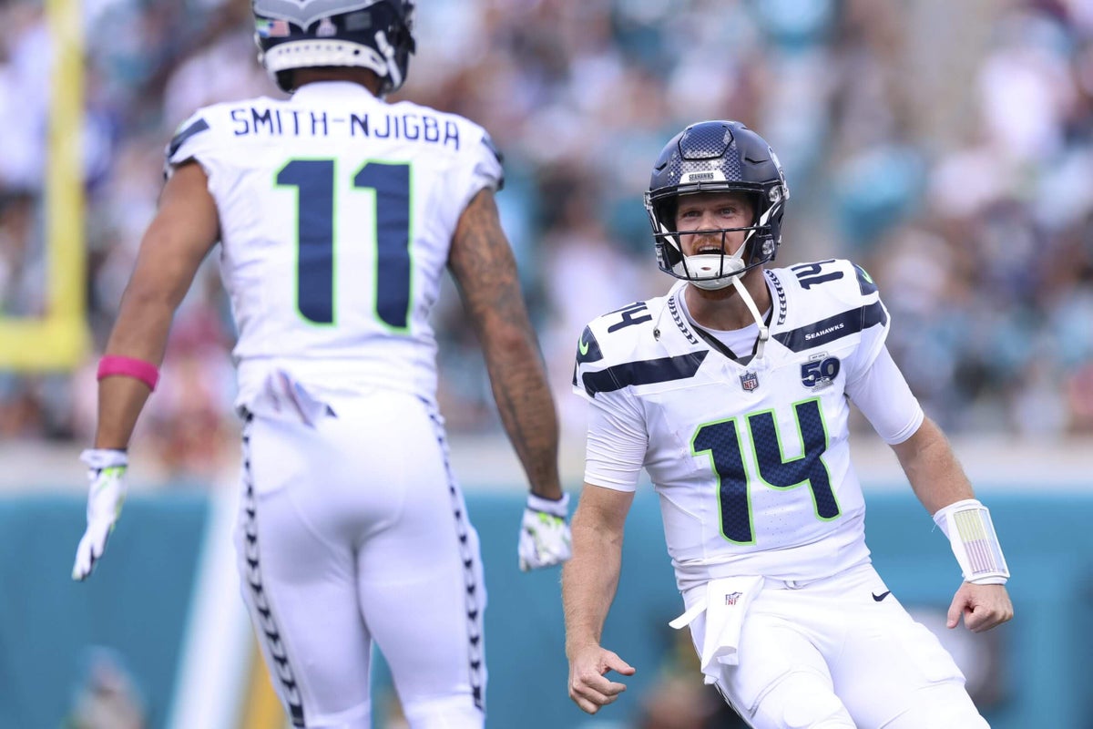 Sam Darnold, Jaxon Smith-Njigba spark yet another Seahawks road victory: ‘We travel heavy’