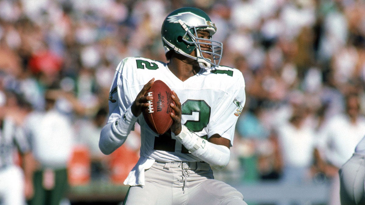 Quarterback Randall Cunningham #12 of the Philadelphia Eagles looks to pass during a game against the Los Angeles Raiders at the Los Angeles Memorial Coliseum Nov. 30, 1986. (George Rose/Getty Images)