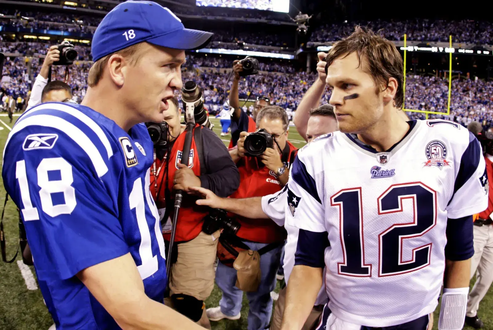 Former Indianapolis Colts QB Peyton Manning and ex-New England Patriots QB Tom Brady