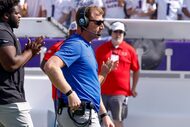 SMU head coach Rhett Lashlee walks the sideline before the first half of an NCAA football...