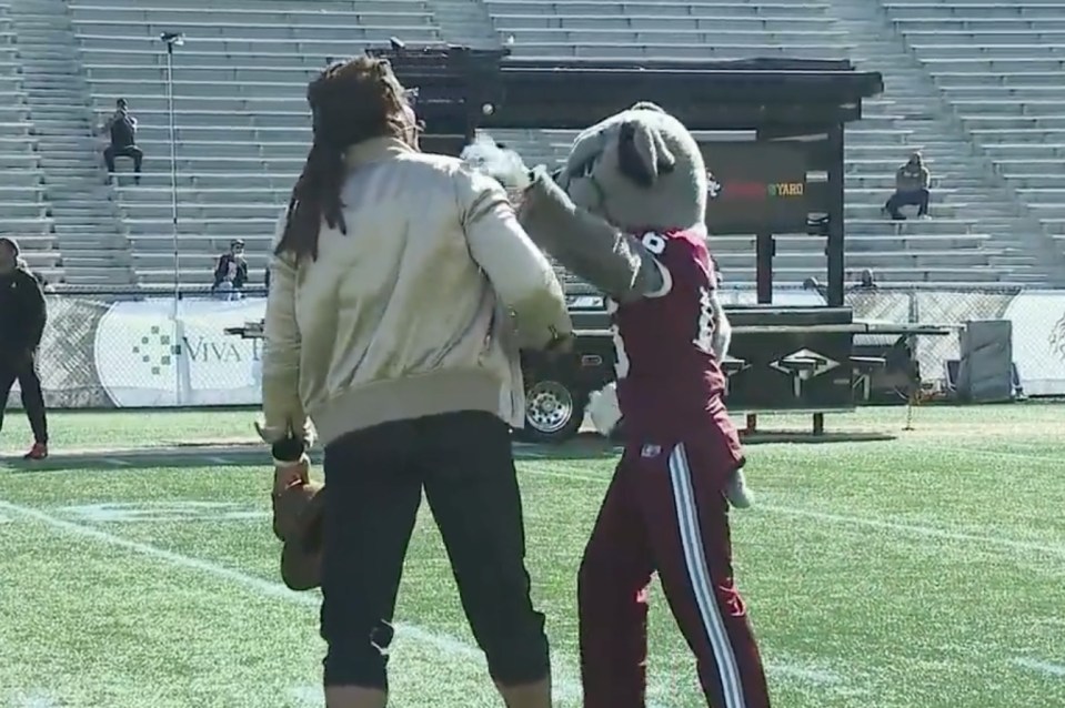 A picture of Cam Newton and the AAMU Bulldog Mascot