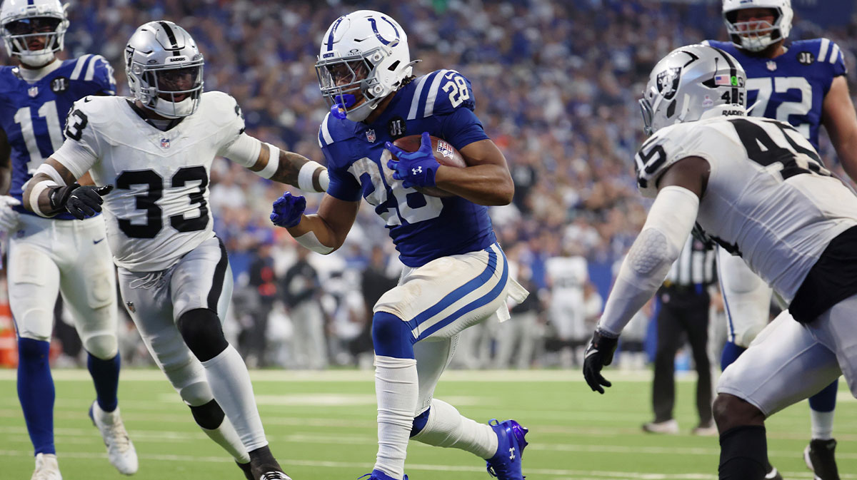 Indianapolis Colts running back Jonathan Taylor (28) scores a touchdown against the Las Vegas Raiders during the second half at Lucas Oil Stadium.