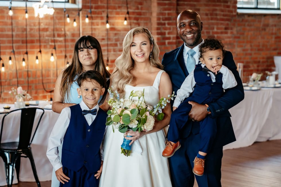 Kasey, Martrez and their kids at their wedding.