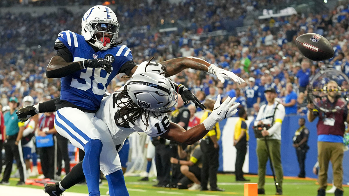 Indianapolis Colts cornerback Chris Lammons (38) takes down Las Vegas Raiders wide receiver Jakobi Meyers (16) as he misses a pass in the end zone Sunday, Oct. 5, 2025, during a game at Lucas Oil Stadium in Indianapolis. The Colts defeated the Raiders 40-6.
