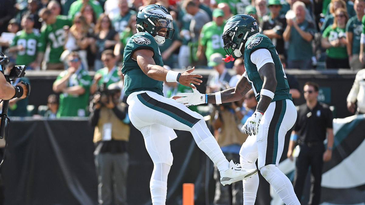 Oct 13, 2024; Philadelphia, Pennsylvania, USA; Philadelphia Eagles quarterback Jalen Hurts (1) and wide receiver A.J. Brown (11) celebrate touchdown against the Cleveland Browns during the second quarter at Lincoln Financial Field.